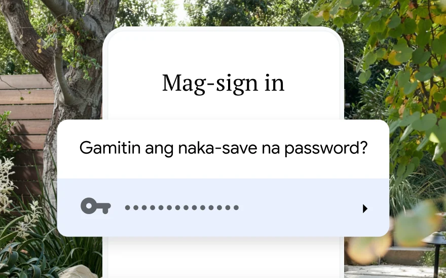 Hinihiling ng page sa pag-sign in para sa pagpapa-reserve ng biyahe na gumamit ng naka-save na password. Isang eksena ng kalikasan ang nasa background.